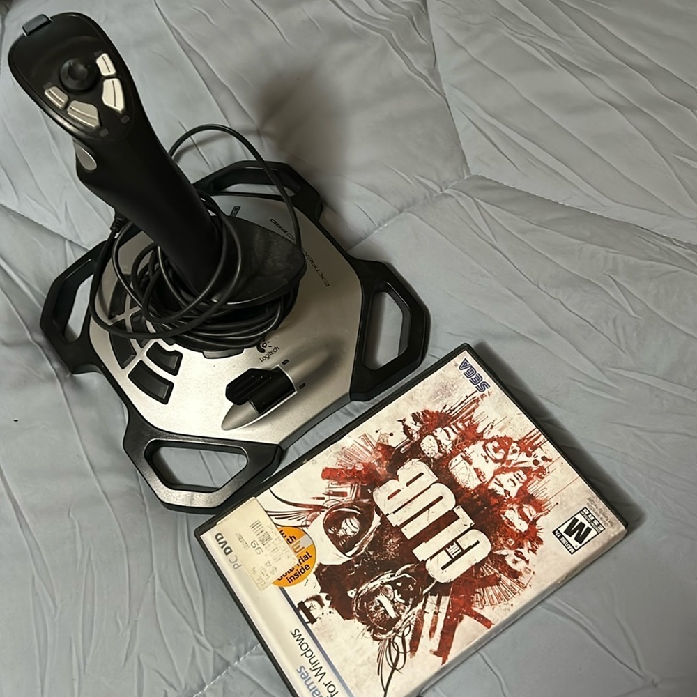 Logitech, extreme 3-D pro joystick/the club a mature game for windows. Vintge